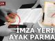 İmzasını ayak parmağı ile attı